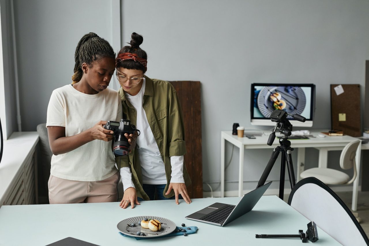 two young photographers in studio